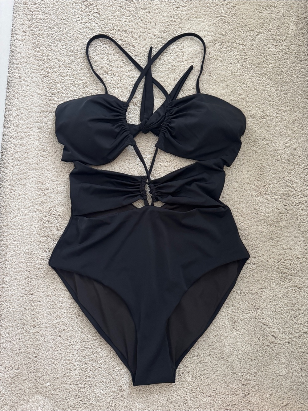 Sleek Black Cutout One-Piece Swimsuit with Tie-Back Straps